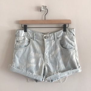Free people light wash distressed denim shorts